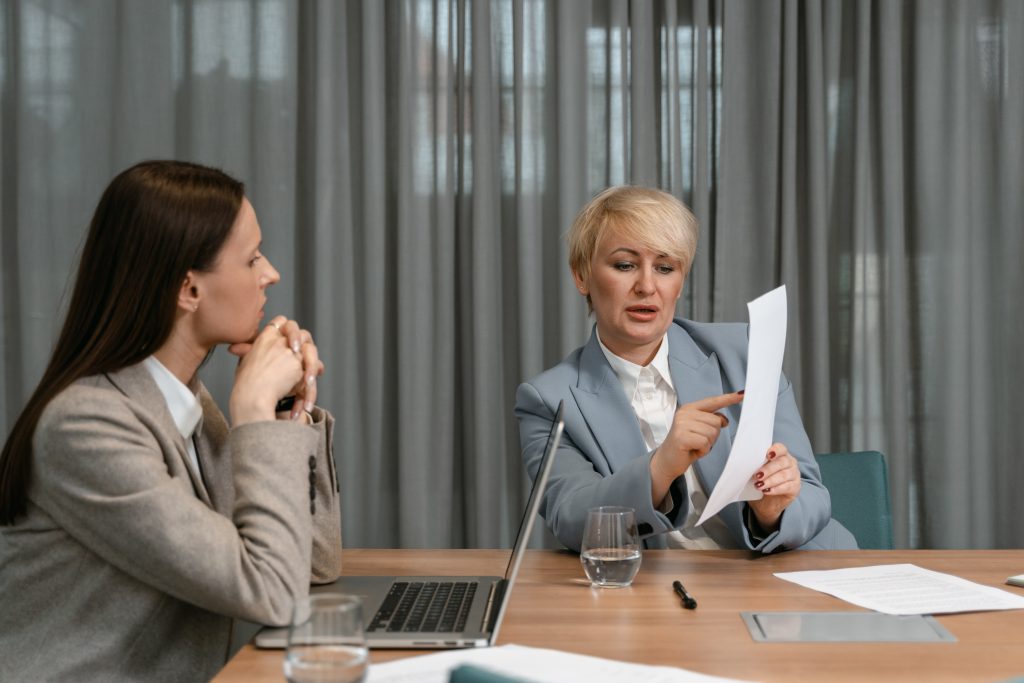 Employee and manager reviewing HR contract